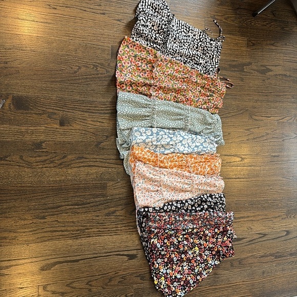 SHEIN Other - Teen 9 floral skirts by SHEIN
8 small
1 medium 
Sold as a LOT
Gently used